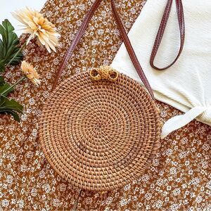 Rattan canister purse.